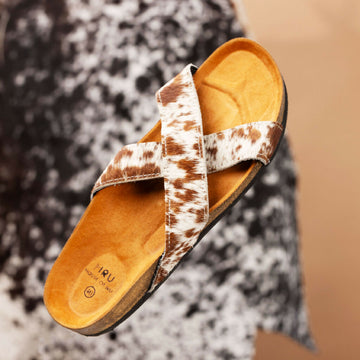 Brown hair on cork sandal