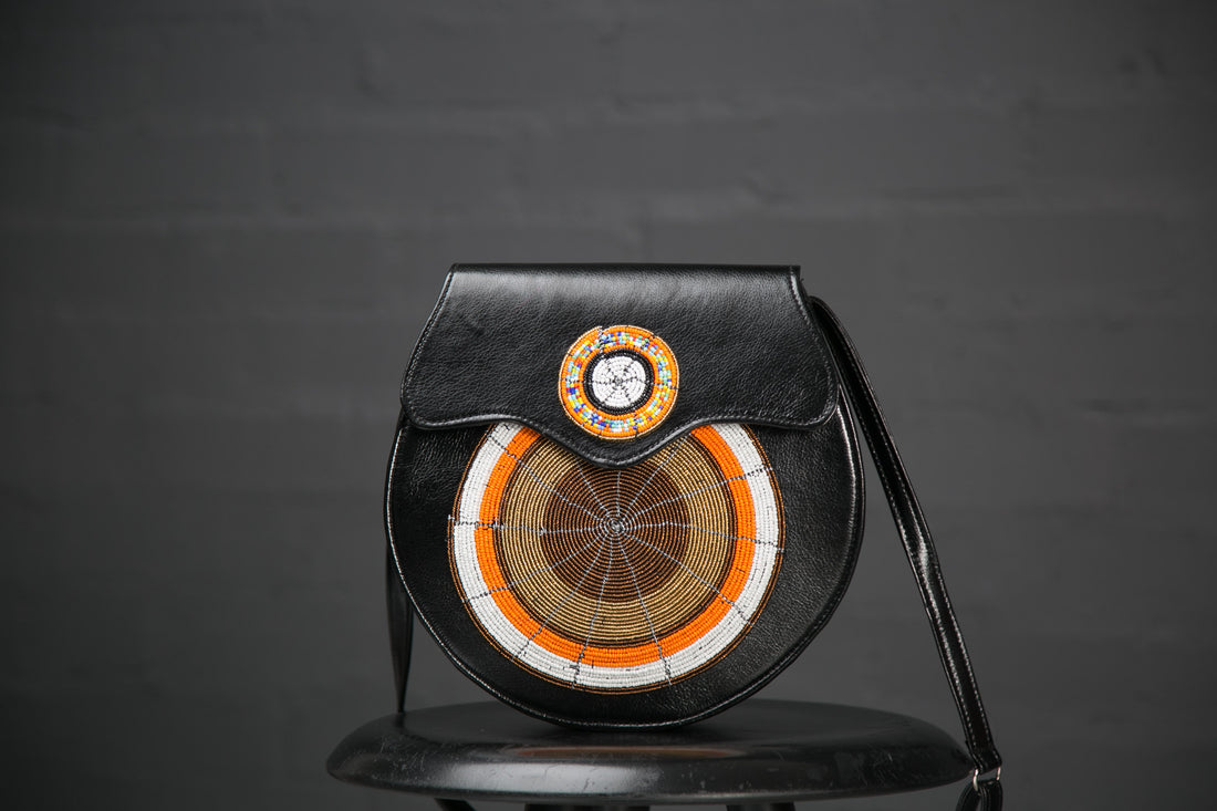 Leather beaded sling bag