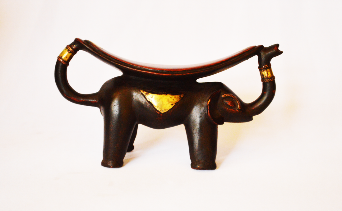 Dinka elephant headrest - Authentic African handicrafts | Clothing, bags, painting, toys & more - CULTURE HUB by Muthoni Unchained