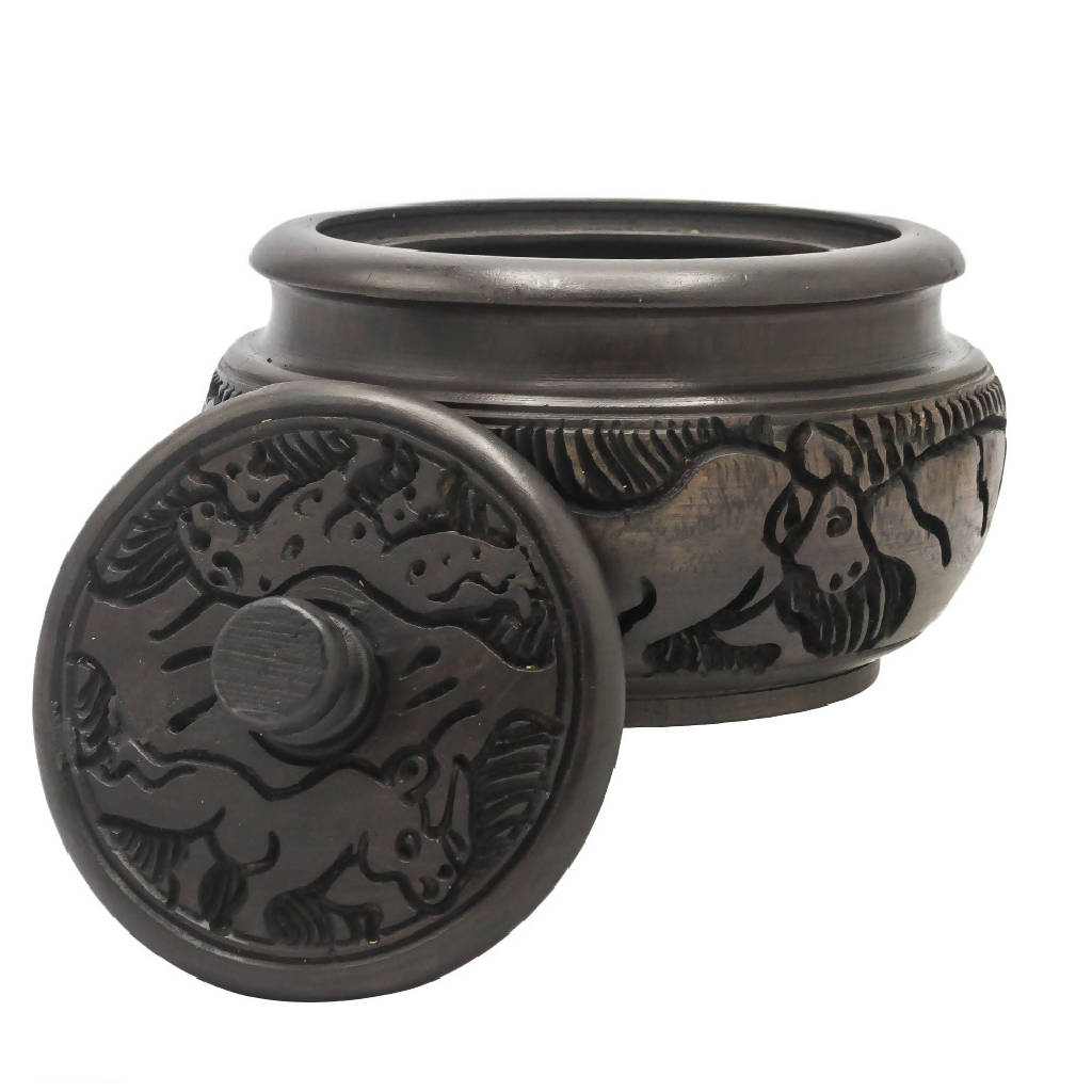 Sugar dish with animal curvings