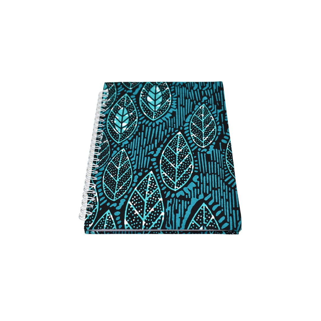 Notebook with blue leaf pattern on a white background