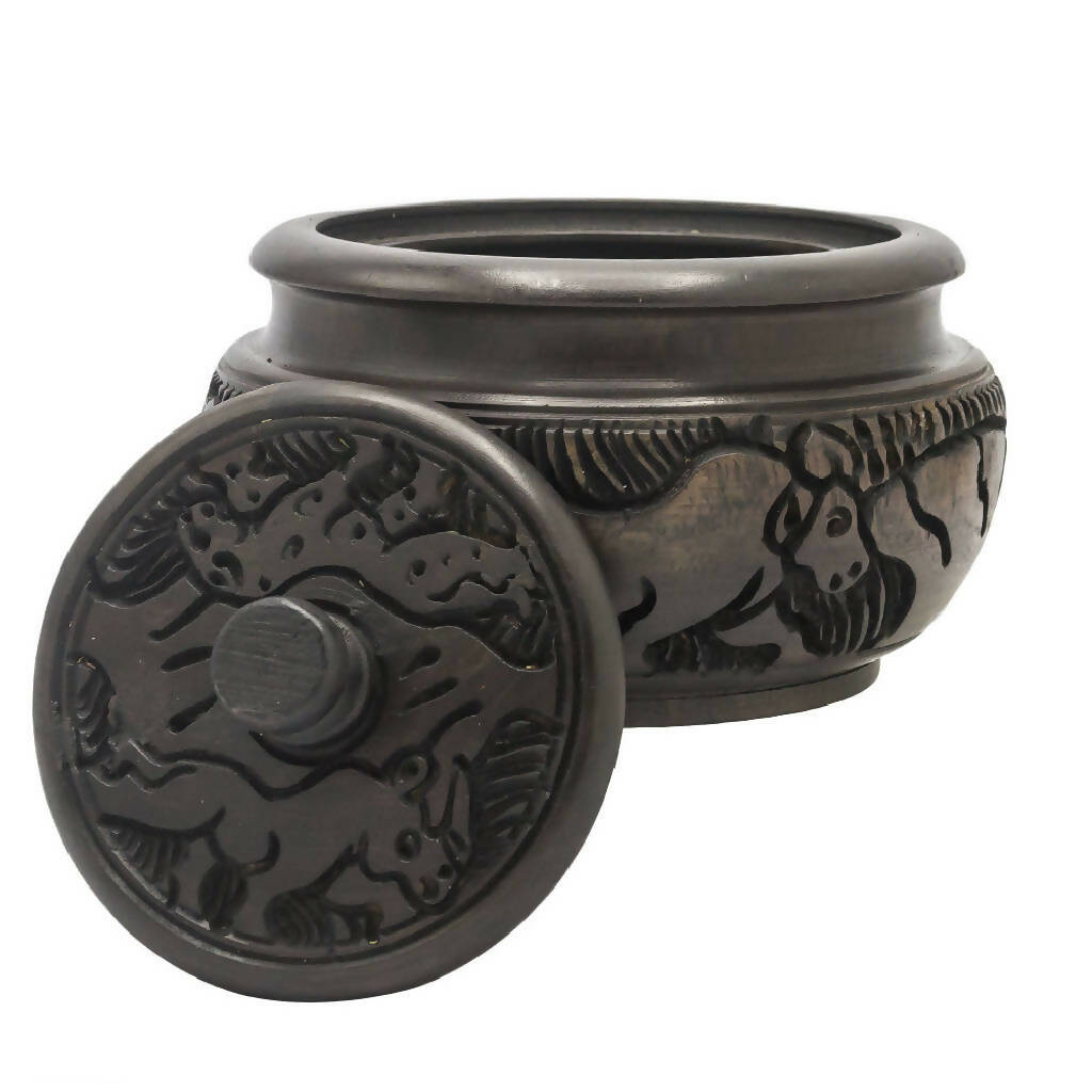 Sugar dish with animal curvings