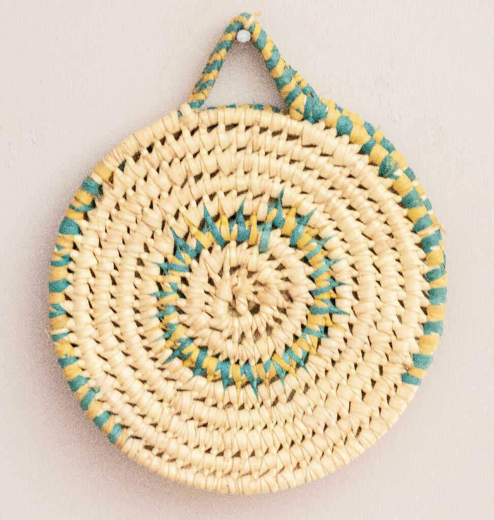 Turquoise and yellow pattern wall decor